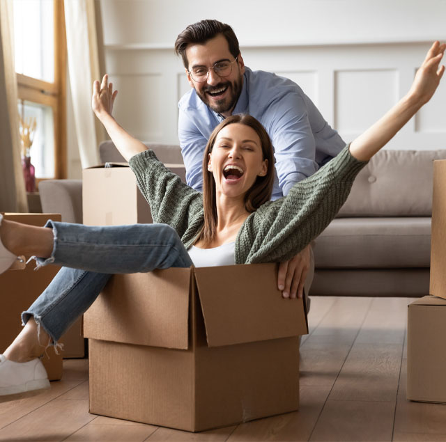 Image showing Happy couple moving in new house