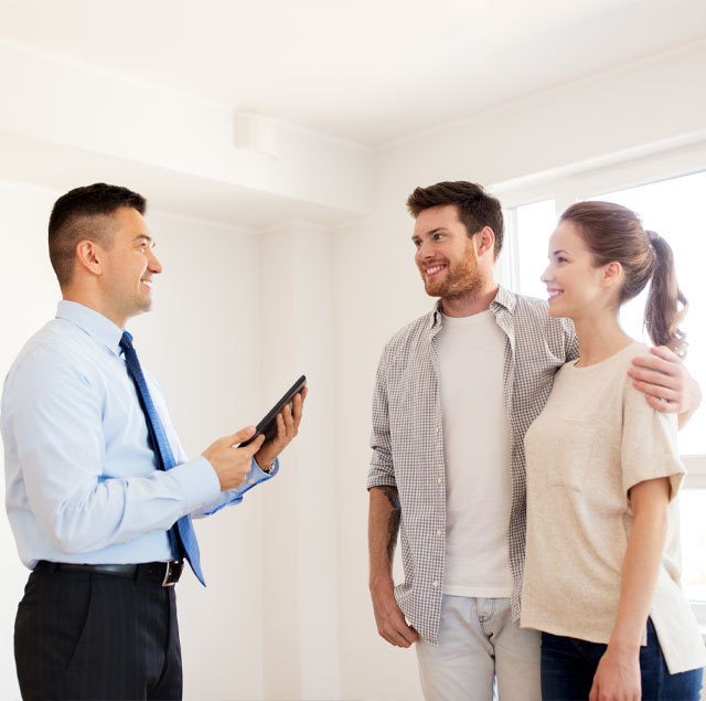 Image showing a happy couple talking to an adviser